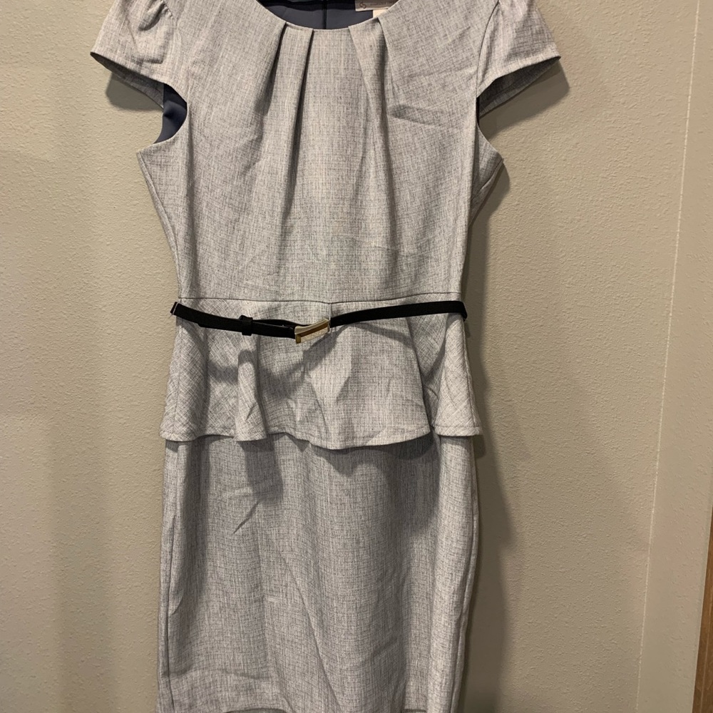 Gray cap sleeve sheath dress.